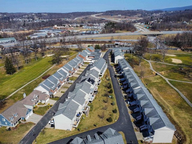 birds eye view of property with a residential view