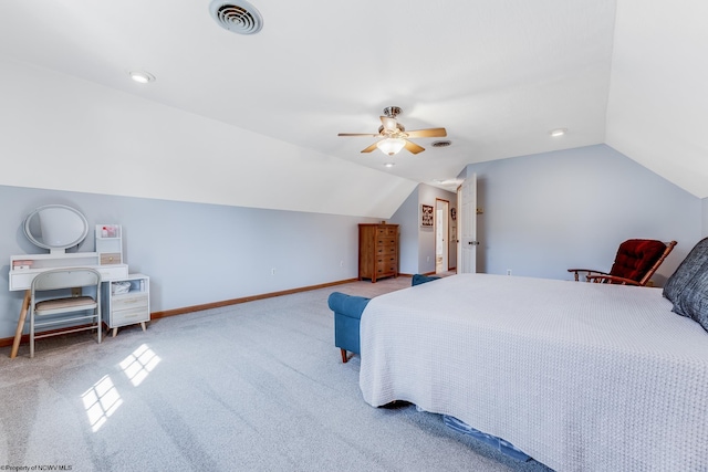 bedroom featuring a ceiling fan, carpet, baseboards, visible vents, and lofted ceiling