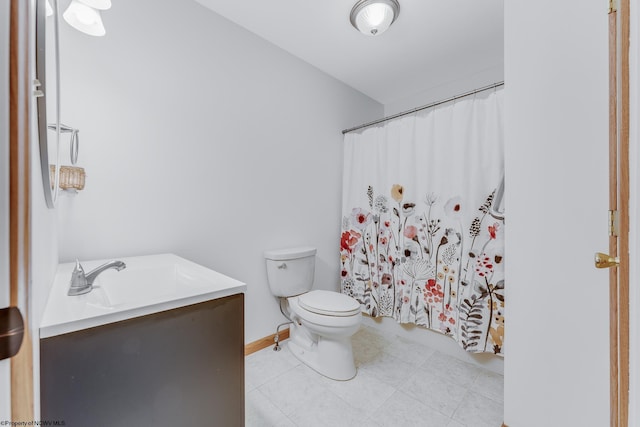 full bathroom with toilet, shower / tub combo with curtain, tile patterned flooring, baseboards, and vanity