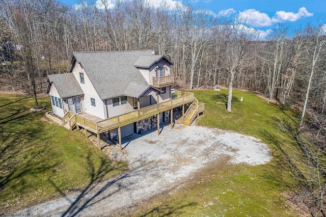 drone / aerial view featuring a view of trees