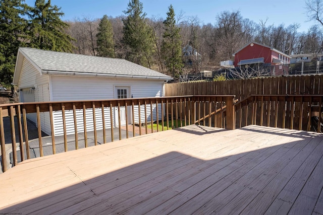 wooden deck featuring fence