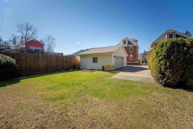 view of property exterior featuring driveway, a yard, and fence