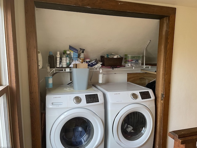 clothes washing area with laundry area and independent washer and dryer