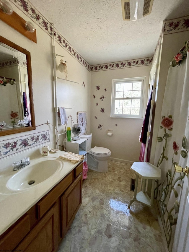 294 Landmark Ests, Jane Lew, WV 26378 - bathroom with visible vents, toilet, a textured ceiling, baseboards, and vanity