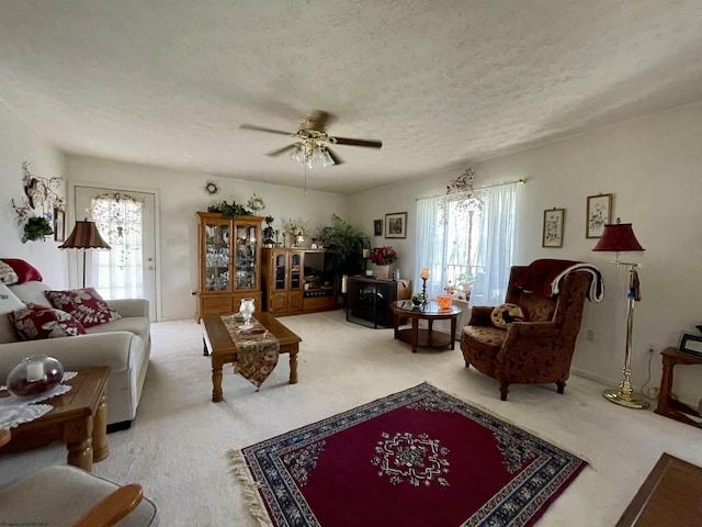 294 Landmark Ests, Jane Lew, WV 26378 - living area featuring a healthy amount of sunlight, a textured ceiling, and a ceiling fan