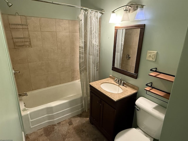 bathroom with vanity, toilet, and shower / bath combo