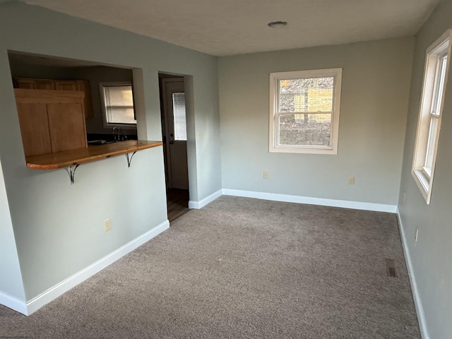 interior space with visible vents and baseboards