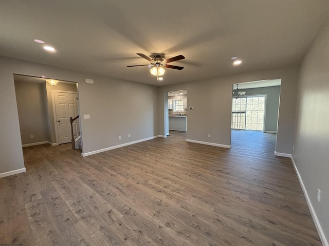 unfurnished living room with recessed lighting, baseboards, wood finished floors, and a ceiling fan