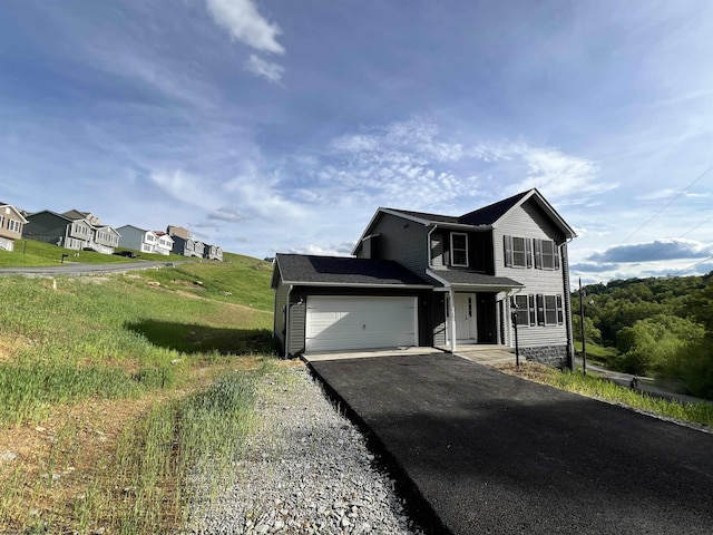 318 Charolais Cir, Fairmont, WV 26554 - view of front of house with asphalt driveway and an attached garage