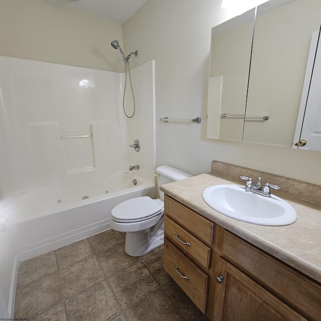 bathroom featuring toilet, vanity, and  shower combination