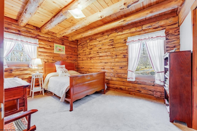 bedroom with beam ceiling, carpet flooring, wooden ceiling, and rustic walls