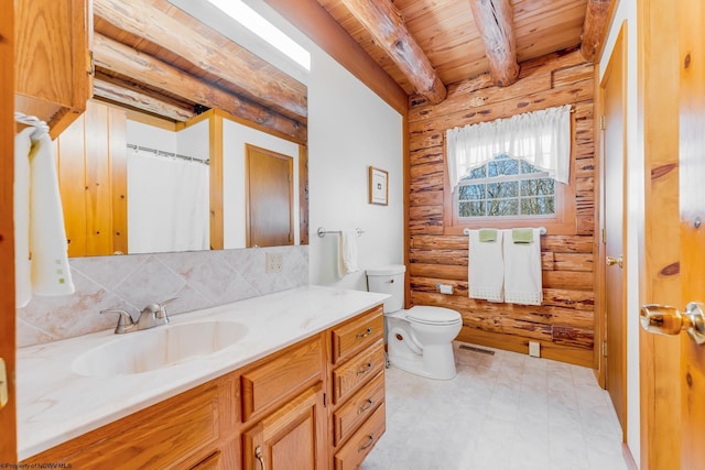 bathroom with visible vents, beam ceiling, decorative backsplash, wood ceiling, and toilet