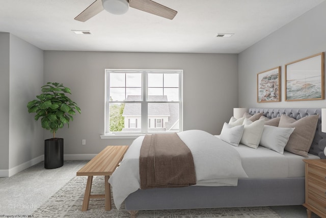 carpeted bedroom featuring baseboards, visible vents, and ceiling fan