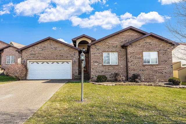 ranch-style home with a garage, driveway, brick siding, and a front yard