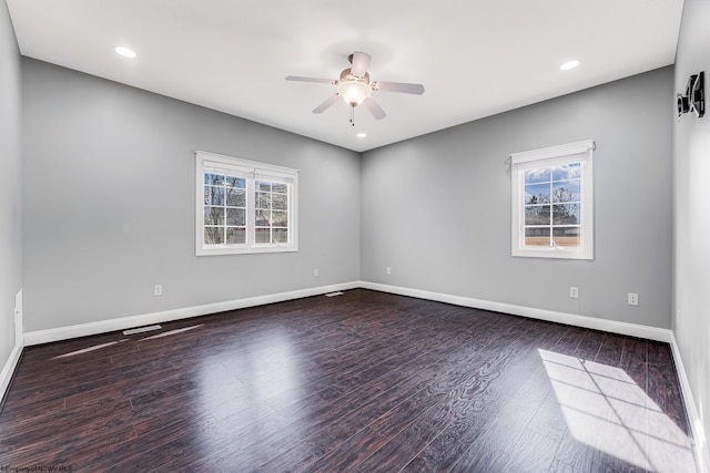 empty room featuring recessed lighting, wood finished floors, baseboards, and ceiling fan