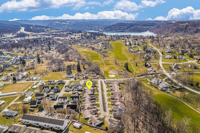 drone / aerial view with a water view