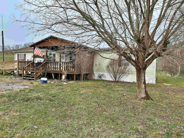 6615 Old Mill Rd, Jane Lew, WV 26378 - rear view of property with a yard and a deck