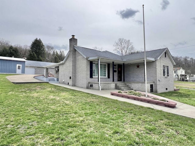 762 Pearl St, Grafton, WV 26354 - view of front of house with a chimney, brick siding, and a front lawn