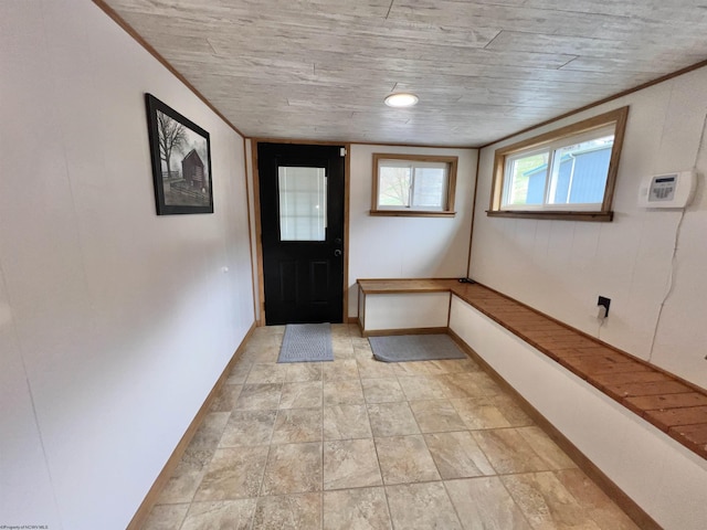 762 Pearl St, Grafton, WV 26354 - doorway to outside featuring wood ceiling, crown molding, and baseboards