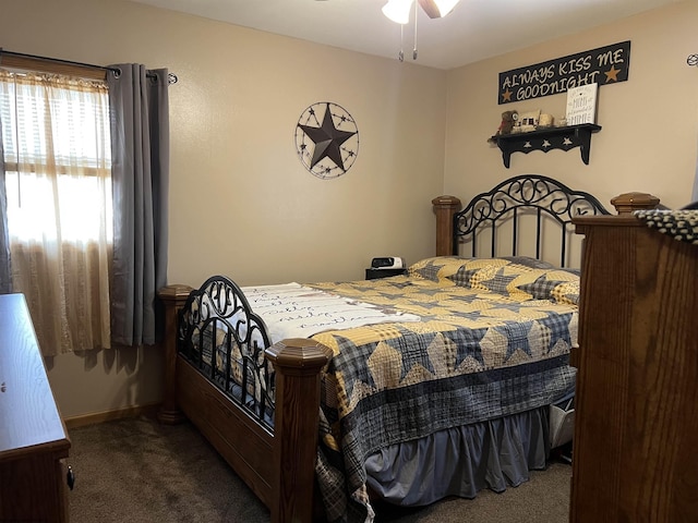 bedroom with baseboards and carpet flooring