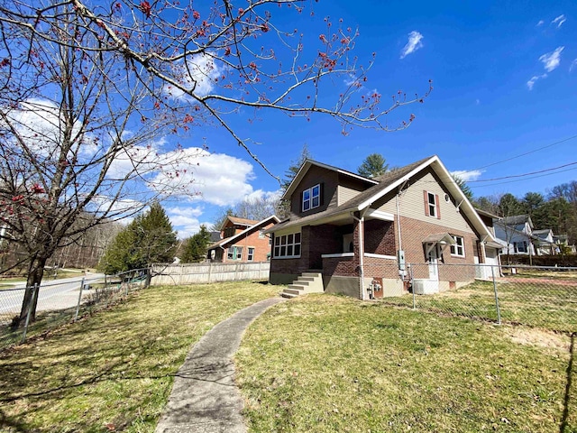 view of property exterior with brick siding, fence private yard, and a yard