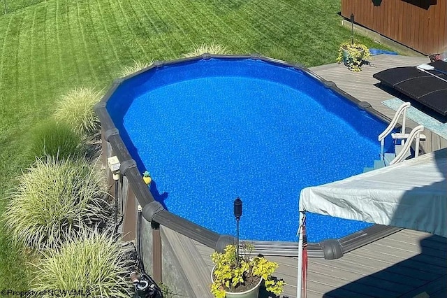 213 Pennsylvania Ave, Bridgeport, WV 26330 - view of pool featuring a wooden deck, a hot tub, and a yard