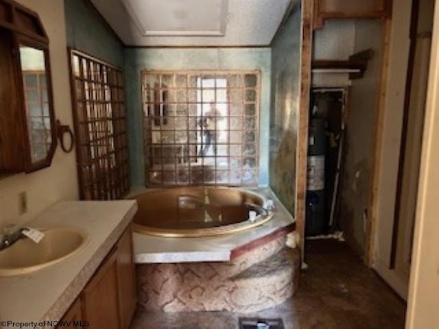 full bathroom with vanity and a garden tub