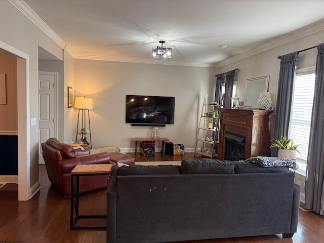 living room with dark wood-style floors, a fireplace, crown molding, and baseboards