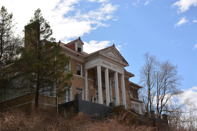 99 High St, Shinnston, WV 26431 - view of home's exterior featuring a tile roof