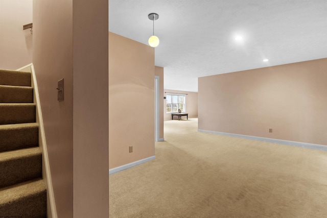 interior space featuring baseboards, recessed lighting, carpet floors, and stairway