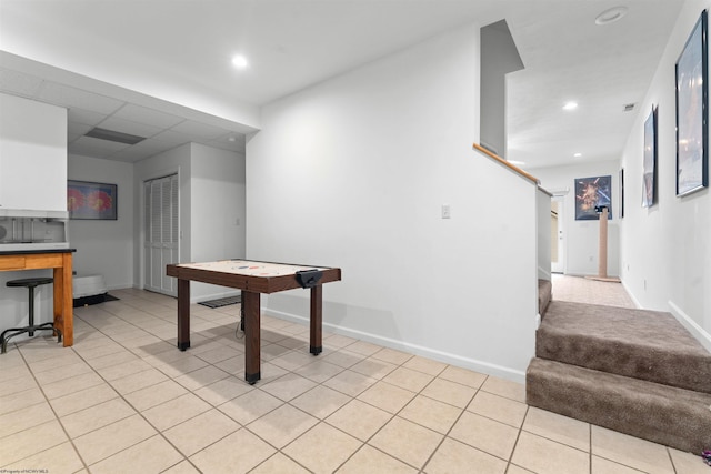 rec room featuring light tile patterned floors, baseboards, and recessed lighting