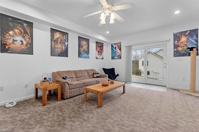 living room featuring light colored carpet, baseboards, recessed lighting, and a ceiling fan