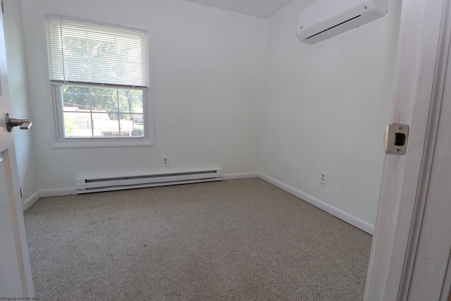 spare room with baseboards, carpet floors, a baseboard heating unit, and an AC wall unit