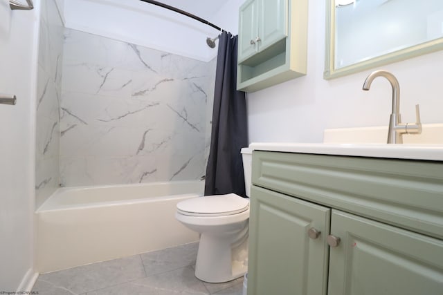 full bath featuring tile patterned floors, toilet, vanity, and shower / bath combo