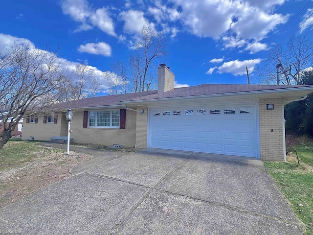 single story home with brick siding, driveway, a chimney, and an attached garage