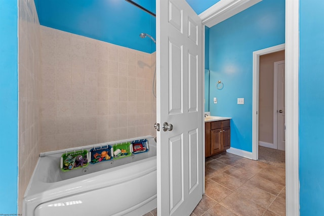 202 Caroline Ln, Morgantown, WV 26508 - bathroom featuring a tub, vanity, tile patterned flooring, and baseboards