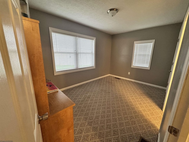 2458 Brushy Fork Rd, Buckhannon, WV 26201 - unfurnished bedroom with visible vents, baseboards, and a textured ceiling
