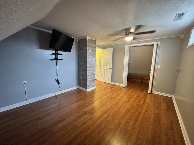 2458 Brushy Fork Rd, Buckhannon, WV 26201 - additional living space with baseboards, a textured ceiling, visible vents, ceiling fan, and wood finished floors