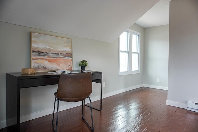 home office featuring baseboards, lofted ceiling, and hardwood / wood-style flooring