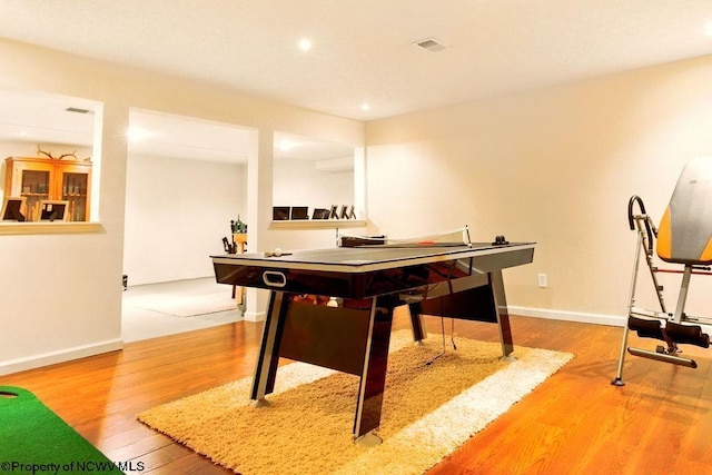 648 Ashberry Dr, Flemington, WV 26347 - playroom featuring wood finished floors, baseboards, visible vents, and recessed lighting