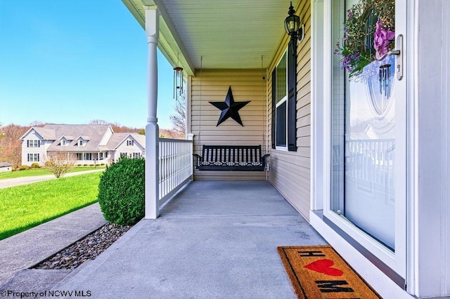 648 Ashberry Dr, Flemington, WV 26347 - view of patio featuring a porch and a residential view
