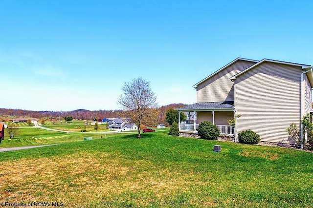 648 Ashberry Dr, Flemington, WV 26347 - view of yard with a porch