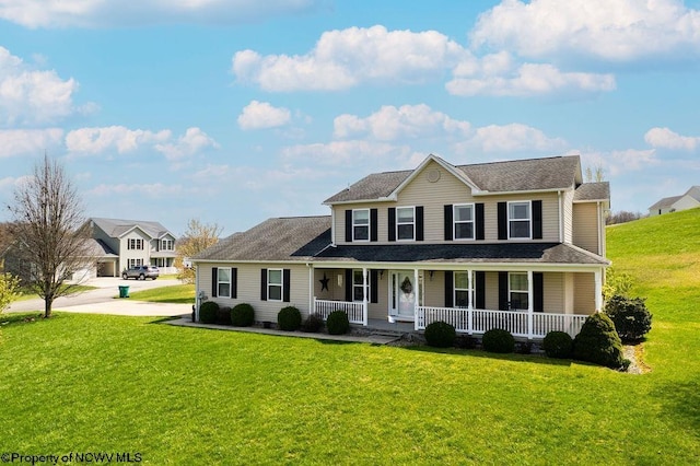 648 Ashberry Dr, Flemington, WV 26347 - colonial home with a front yard and a porch
