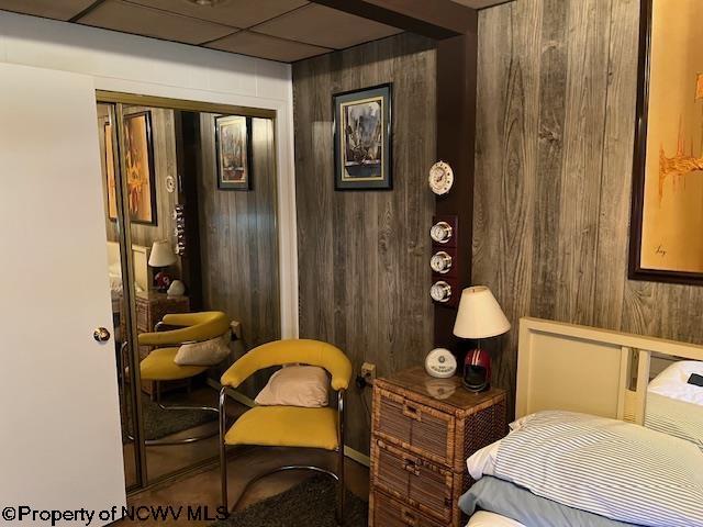 140 Roney Rd, Elkins, WV 26241 - bedroom with wooden walls and a closet