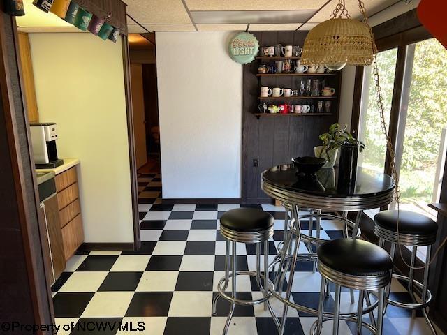140 Roney Rd, Elkins, WV 26241 - dining space with tile patterned floors, plenty of natural light, and baseboards