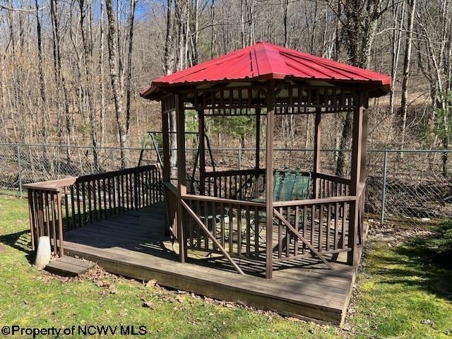 140 Roney Rd, Elkins, WV 26241 - wooden terrace with a view of trees and fence