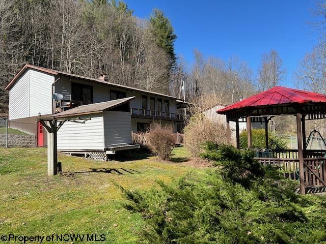 140 Roney Rd, Elkins, WV 26241 - exterior space featuring a yard, a gazebo, an outdoor structure, and a storage unit