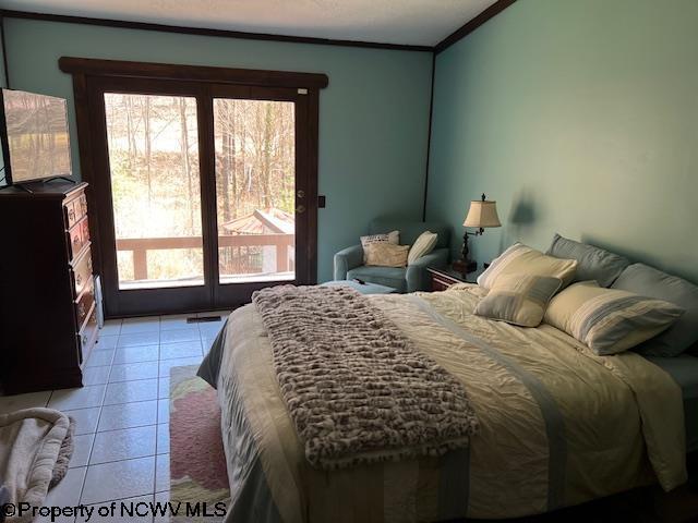 140 Roney Rd, Elkins, WV 26241 - bedroom with ornamental molding, access to outside, and light tile patterned flooring