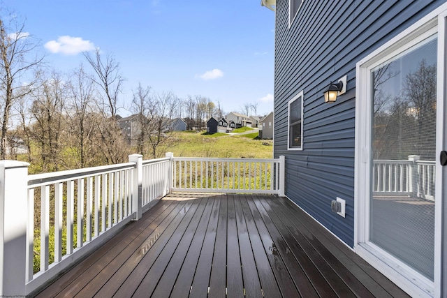 wooden deck with a residential view