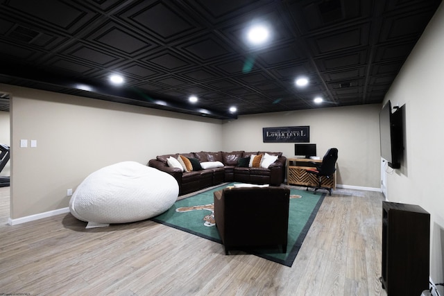 living room with recessed lighting, baseboards, an ornate ceiling, and light wood-style flooring